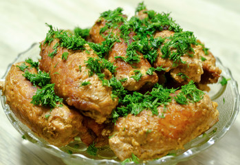 fried meat dish with greens