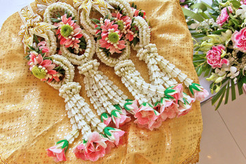 Thai handcrafting floral garland (Phuang Malai) is beautiful and artistic creation of flower garland as symbol of luck ,love ,respect in Thai culture such as wedding ceremony ,present for parents