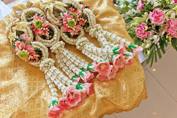Thai handcrafting floral garland (Phuang Malai) is beautiful and artistic creation of flower garland as symbol of luck ,love ,respect in Thai culture such as wedding ceremony ,present for parents