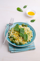 Vegetable salad with olives and spinach