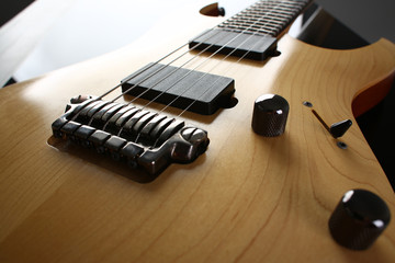 Classic shape wooden electric guitar with rosewood neck