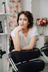 beautiful girl working in a beauty salon