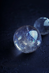 quartz ball, rhinestone mineral. beautiful gemstones quartz mineral for meditation, relaxation on black background. Crystal Ritual, Witchcraft, Meditation, Healing magic. close up.  copy space