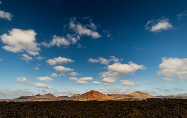 Red volcano in Canary near the ocean