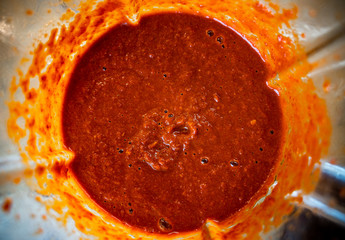 Chocolate Habanero chili pepper (Capsicum chinense) sauce in a blender. Healthy and really hot...