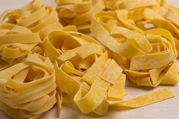 Durum wheat pasta on a white background. Organic food.