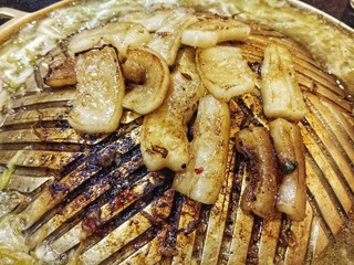 Pork lard on the barbecue pan - unhealthy food