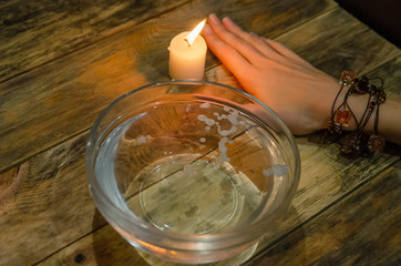 Divination with a candle on the water. concept of magic, divination