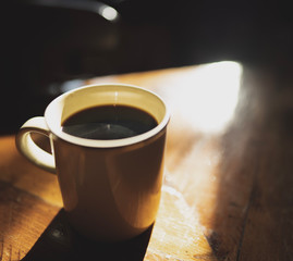 cup of coffee on black background