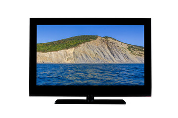 full hd monitor or TV with an island in the sea on the screen isolated on white background