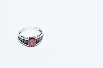 Silver ring decorated with Red Garnet stone