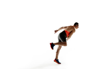 Male athlete practicing in throwing javelin isolated on white studio background. Professional sportsman training in motion, action. Concept of healthy lifestyle, movement, activity. Copyspace.