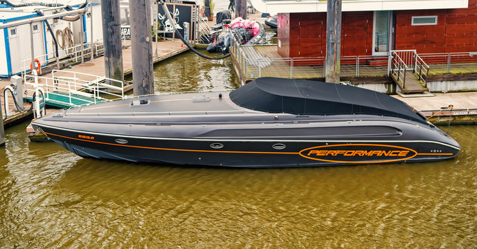 Motor boat at pier in Elbe harbor in Hamburg, Germany