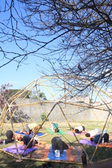Yoga class inside a geodesic made of bamboo at Ecopatio Arca21 in São José dos Campos - SP,...