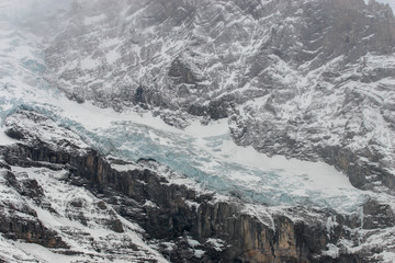 Fototapeta premium Mönch Mountain, Jungfrau Mountain in fog , Bernese Oberland, Canton of Bern, Switzerland, Europe