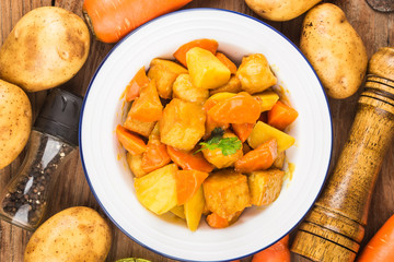 Fish balls with curry, potatoes and carrots