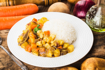 Potato, carrot, chicken and curry rice