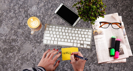 Marble Office Desk with office Accessories on it