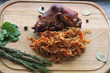 Pork knuckle with sauerkraut. Aisbane. Oktoberfest menu.