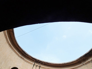 Obraz premium Blue sky view in the void of Sumur Gumuling building in Taman Sari area