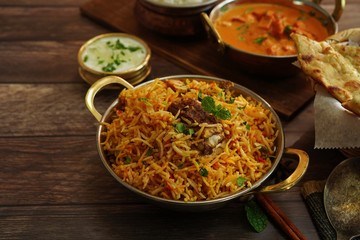 Indian meal / Restaurant menu concept - Mutton biryani, butter chicken, Roti