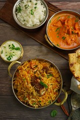 Indian meal / Restaurant menu concept - Mutton biryani, butter chicken, Roti