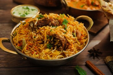 Indian meal / Restaurant menu concept - Mutton biryani, butter chicken, Roti