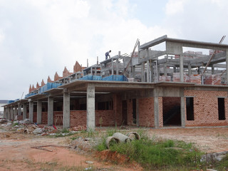 Double story luxury terrace house under construction in Malaysia.  Designed by an architect with a modern and contemporary style. 