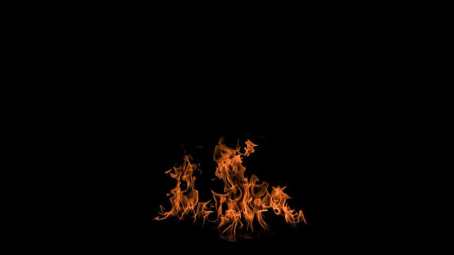 Fire flames in slow motion on an isolated black background