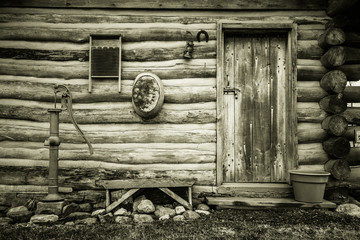 Simple Country Living. Exterior wall of a historical log cabin in Midwest America. This is a historical public display in Maysville, Michigan. It is not a a private property or residence. - obrazy, fototapety, plakaty