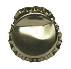 Golden bottle cap for beer isolated on white, macro
