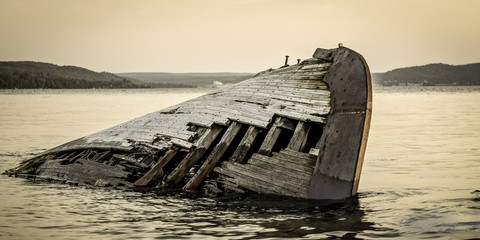 Great Lakes Shipwreck. Historic wooden boat shipwrecked on the coast of Lake Superior in the...