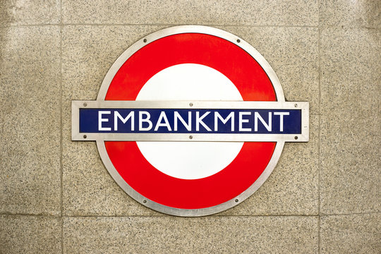 London, United Kingdom - October 9, 2018; Embankment metro sign in London, a cenral metro station conneting, the circle line, the district line, bakerloo line and Northern line