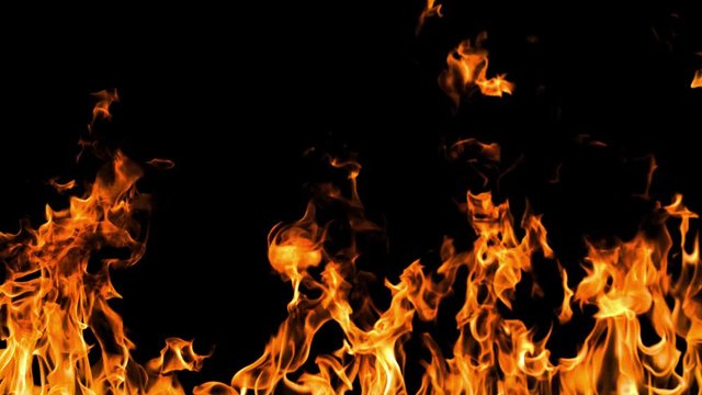 Slow motion shot of fire flames isolated on a black background