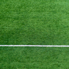 Obraz premium football field. Bright juicy perfect green grass. background. high image quality
