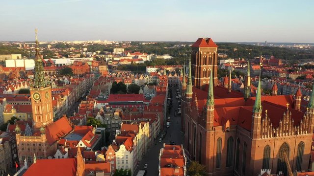 Gdansk old city in the rays of the rising sun, top view of the old city streets. 4K video