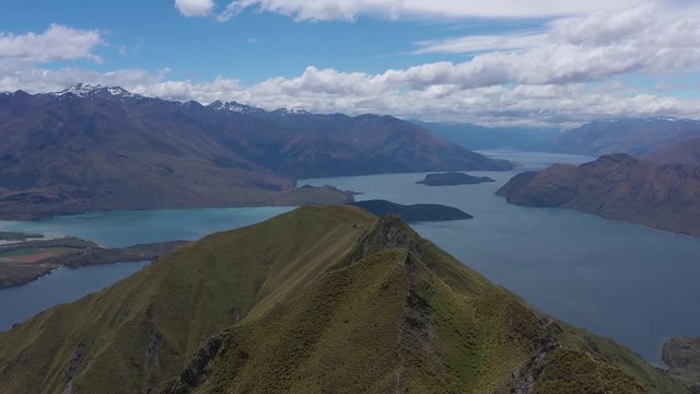 aerial view over roys peak in south new zealand, new zealands alps from above, aerial view over the mountains of new zealand