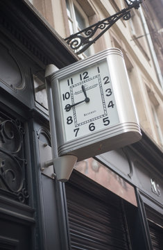 Strasbourg - France - 1 January 2020 -  Closeup of big clock on the facade of luxury watches store by jaeger lecoultre