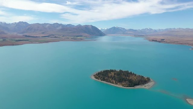 aerial view over lake tekapo in south new zealand, amazing drone shot over lake tekapo in new zealand