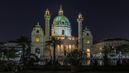 Fototapeta na wymiar Karlskirche on the Karlsplatz square night timelapse hyperlapse in Vienna, Austria.