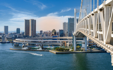 Tokyo Bay with Rainbow  Bridge  and Tokyo  skyline, Japan