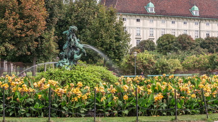 Volksgarten timelapse, or People Garden public green park with roses in Vienna of Austria.