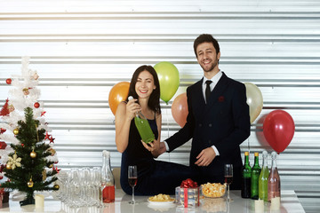 Sweet couple Love smile and spending Romantic with drinking wine in christmas time and celebrating...