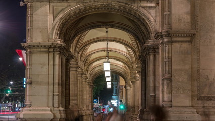 Arch with columns of Vienna Opera night timelapse.