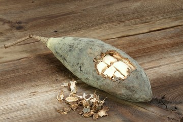 Baobab fruit, pulp and powder on the wooden table