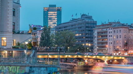 Naklejka premium Vienna cityscape with the Danube channel day to night timelapse in Vienna. Austria.