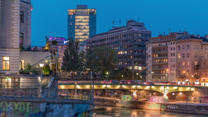 Vienna cityscape with the Danube channel day to night timelapse in Vienna. Austria.