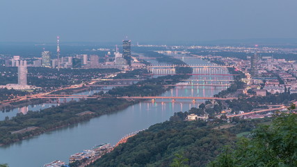 Skyline of Vienna from Danube Viewpoint Leopoldsberg aerial day to night timelapse.