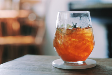 A glass of ice tea in cafe