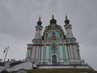 Fototapeta na wymiar View of St. Andrew's Church in Kiev in cloudy winter weather